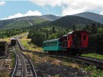 MWCR 3 - Abenaki passes our train heading up the mountain just above Waumbek Water Tank